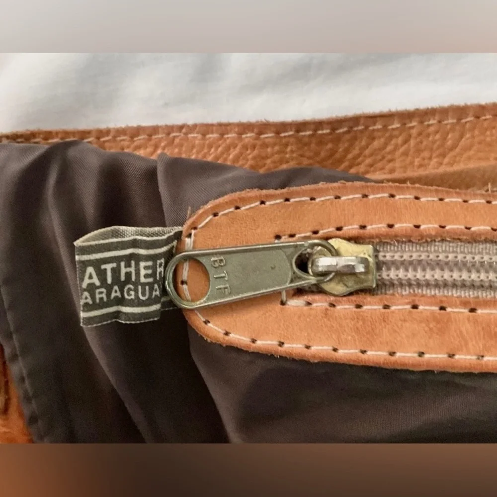 Tan Leather Bucket Bag with Embossed Detail